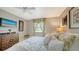 This bedroom features neutral decor, bright natural light, and carpeted floors at 3842 Glen Oaks Manor Dr, Sarasota, FL 34232