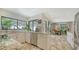 Bright kitchen features granite countertops, stainless appliances, and tile flooring at 3842 Glen Oaks Manor Dr, Sarasota, FL 34232
