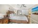 Comfortable main bedroom featuring refined decor and access to the ensuite bathroom at 3842 Glen Oaks Manor Dr, Sarasota, FL 34232