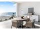 Enjoy outdoor dining on this balcony with a grill and ocean view at 4765 Gulf Of Mexico Dr # B202, Longboat Key, FL 34228