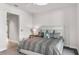 Bright bedroom with modern decor, neutral color palette, and ample natural light at 4765 Gulf Of Mexico Dr # B202, Longboat Key, FL 34228