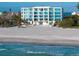 Beautiful beachfront condominium building boasting private balconies and expansive views of the Gulf at 4765 Gulf Of Mexico Dr # B202, Longboat Key, FL 34228