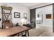 Serene office space with comfortable seating, a modern desk, and a stylish sliding door at 4765 Gulf Of Mexico Dr # B202, Longboat Key, FL 34228