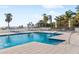 Refreshing pool with a beach view surrounded by lush tropical landscaping at 4765 Gulf Of Mexico Dr # B202, Longboat Key, FL 34228