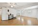 Spacious bedroom features hardwood floors, ceiling fan and mirrored closet at 4803 Brae Burn Ave, Sarasota, FL 34234