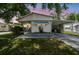 Charming single-story home featuring a covered carport and well-maintained landscaping, perfect for comfortable living at 4803 Brae Burn Ave, Sarasota, FL 34234