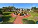 Charming fountain area with pumpkin decorations at 4803 Brae Burn Ave, Sarasota, FL 34234