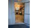 Functional workshop with storage shelves, utility sink, and durable flooring for various projects at 4803 Brae Burn Ave, Sarasota, FL 34234