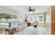 Bright living room with comfortable seating, natural light, and views of the outdoors at 504 Whitfield Ave, Sarasota, FL 34243