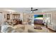 Inviting living room with plush seating, wood floors, and a view of the home's entry at 504 Whitfield Ave, Sarasota, FL 34243