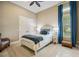 Cozy bedroom with neutral colors and a window view at 5313 Greenbrook Dr, Sarasota, FL 34238