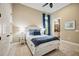 Charming bedroom with ensuite bathroom access and a calming color palette at 5313 Greenbrook Dr, Sarasota, FL 34238
