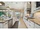 Bright and airy kitchen with stainless steel appliances and granite countertops at 5313 Greenbrook Dr, Sarasota, FL 34238