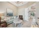 Cozy living room with comfortable seating, area rug, and a bright window at 5313 Greenbrook Dr, Sarasota, FL 34238