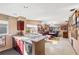 An inviting living space with abundant natural light and seamless flow into the dining area at 5500 Longwood Run Blvd # 201, Sarasota, FL 34243