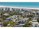 Aerial view showcasing property's prime location near a beautiful beach and nearby attractions at 5512 Avenida Del Mare, Sarasota, FL 34242