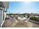 Exterior deck with seating, tables, decor and scenic views at 5512 Avenida Del Mare, Sarasota, FL 34242
