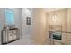 Stylish hallway showcasing elegant decor, modern lighting fixtures, and impeccable design details throughout the home at 5930 Briarwood Ave, Sarasota, FL 34231