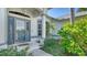 Close-up of the charming front door with decorative wreath and inviting entryway at 626 Magellan Dr, Sarasota, FL 34243