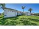 Beautiful single-story home featuring well-kept lawns and a two car attached garage at 626 Magellan Dr, Sarasota, FL 34243