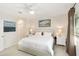 Spacious bedroom offers ample closet space and serene decor, perfect for a relaxing and restful environment at 6492 Positano Ct, Sarasota, FL 34243
