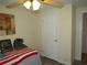 Bedroom showcasing wood-look floors and comfortable sleeping quarters at 705 Blackburn Blvd, North Port, FL 34287