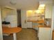 Functional kitchen featuring cabinetry and an eat-in area at 705 Blackburn Blvd, North Port, FL 34287