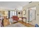 Inviting living room with stylish furnishings, ceiling fan, and lots of natural light at 7542 Swanson Ln, Sarasota, FL 34231