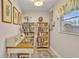 Cozy office space with built-in bookshelves and natural light at 7542 Swanson Ln, Sarasota, FL 34231