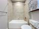 Bathroom with tub, shower and granite countertop at 7810 34Th W Ave # 103, Bradenton, FL 34209