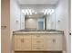 Bright bathroom featuring granite counters, double sinks, and contemporary lighting at 7810 34Th W Ave # 103, Bradenton, FL 34209