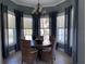Dining room with seating for four and large windows that offer natural light and neighborhood views at 7810 34Th W Ave # 103, Bradenton, FL 34209