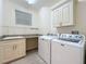 Bright laundry room with modern appliances and countertop with sink at 7810 34Th W Ave # 103, Bradenton, FL 34209
