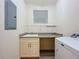Bright laundry room with modern appliances and countertop with sink at 7810 34Th W Ave # 103, Bradenton, FL 34209