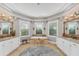 Luxurious primary bathroom with a soaking tub, dual sinks, and plenty of counter space at 909 143Rd Ne St, Bradenton, FL 34212