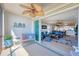 Open concept design seamlessly connects the screened patio, living room, and kitchen at 9203 Griggs Rd # B102, Englewood, FL 34224