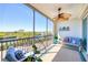 Relax and unwind on this screened patio with a lovely lake view and comfortable seating at 9203 Griggs Rd # B102, Englewood, FL 34224