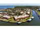 Waterfront condo community featuring boat docks, mature landscaping, and convenient water access at 9619 Valencia Cv, Bradenton, FL 34210