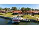 Waterfront home with private dock and boat lift and lush landscaping at 9619 Valencia Cv, Bradenton, FL 34210