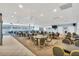 Spacious meeting room featuring tables, chairs, ceiling fans and ample space for gatherings and events at 9619 Valencia Cv, Bradenton, FL 34210