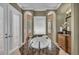 Bright bathroom with a soaking tub, marble countertops, dual sinks, and natural light creates a spa-like atmosphere at 1110 79Th E St, Palmetto, FL 34221