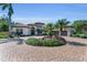 Elegant home featuring a grand entrance, well-manicured landscaping, and a circular driveway at 1110 79Th E St, Palmetto, FL 34221