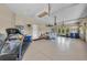 Spacious garage with high ceilings and room for workout equipment at 1110 79Th E St, Palmetto, FL 34221