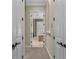 Hallway offering a view into a bathroom with soaking tub at 1110 79Th E St, Palmetto, FL 34221