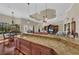 Expansive kitchen island with granite countertops offering ample space for dining, meal preparation, and entertaining at 1110 79Th E St, Palmetto, FL 34221