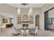 Inviting living room with fireplace, built-in shelves, and comfortable seating, great for relaxing or entertaining guests at 1110 79Th E St, Palmetto, FL 34221