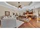 Open-concept living room with a game room, dining room, and gourmet kitchen at 1110 79Th E St, Palmetto, FL 34221