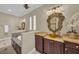 The main bathroom has double sinks, a garden tub, and decorative fixtures at 1110 79Th E St, Palmetto, FL 34221
