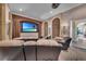 This is a large home theater offering reclining seating and a large viewing screen at 1110 79Th E St, Palmetto, FL 34221