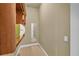 Neutral-colored walk-in closet with minimal built-ins offers a blank slate for personalization and organization at 1110 79Th E St, Palmetto, FL 34221